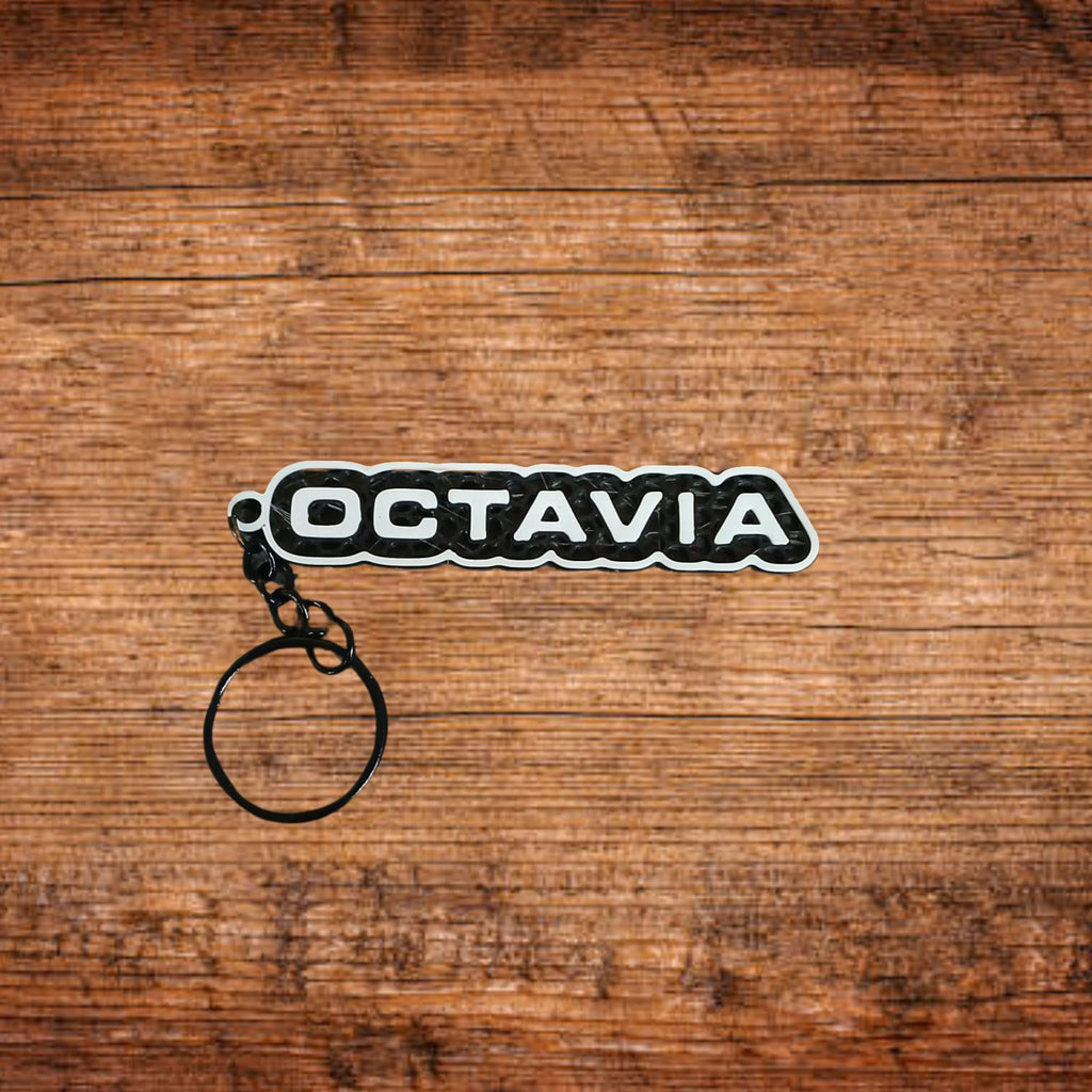 Skoda Octavia Schlüsselanhänger mit schwarzem Anhänger und weißer OCTAVIA-Schrift