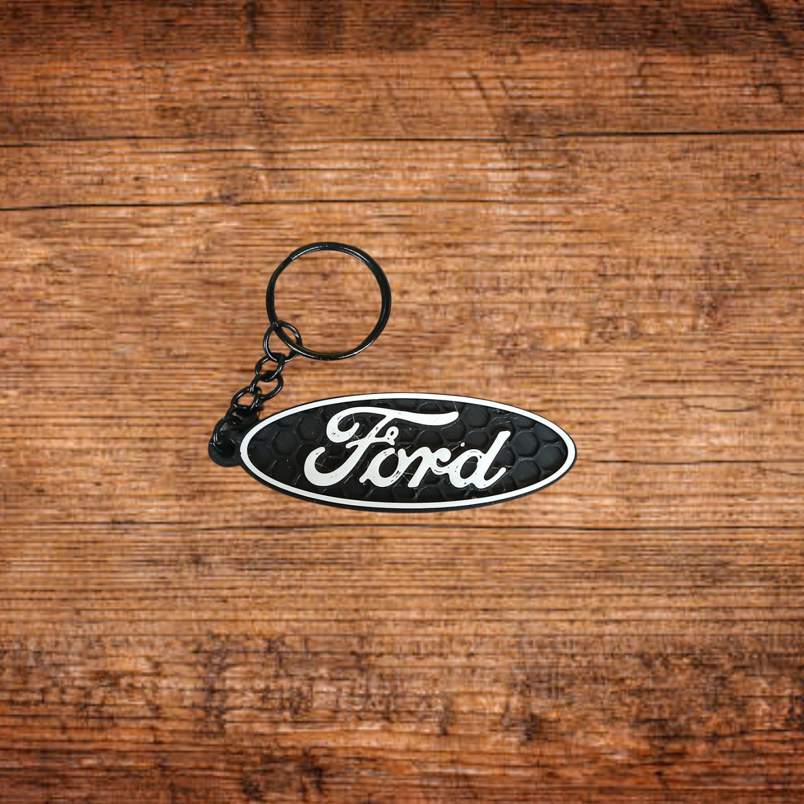 Schlüsselanhänger mit Ford-Logo im ovalen Emblem