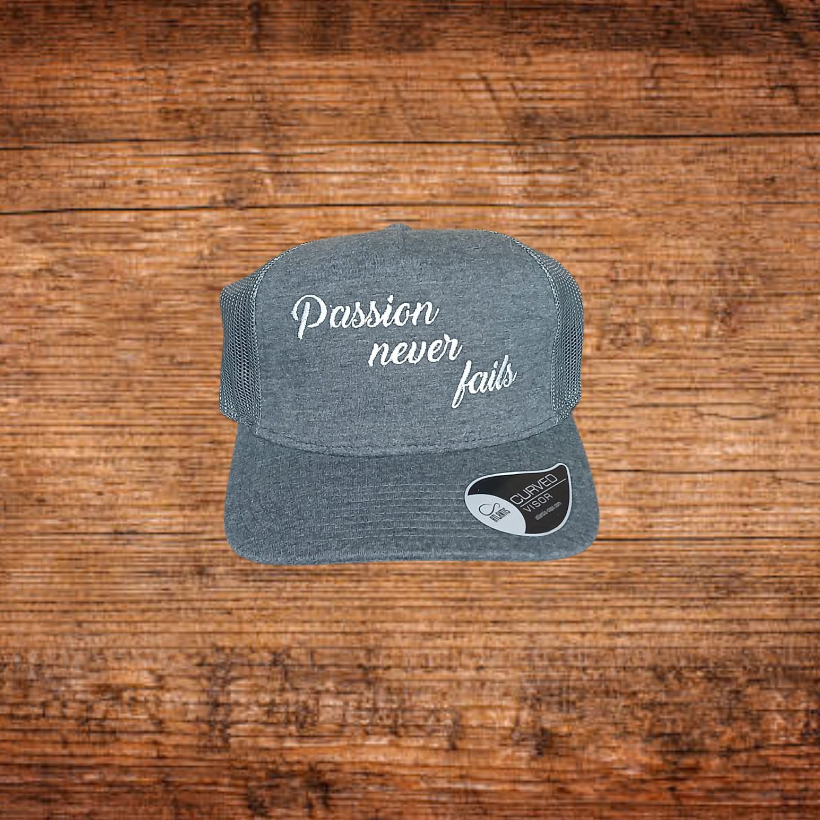 Basecap Passion dunkelgrau mit Frontschriftzug „Passion never fails“
