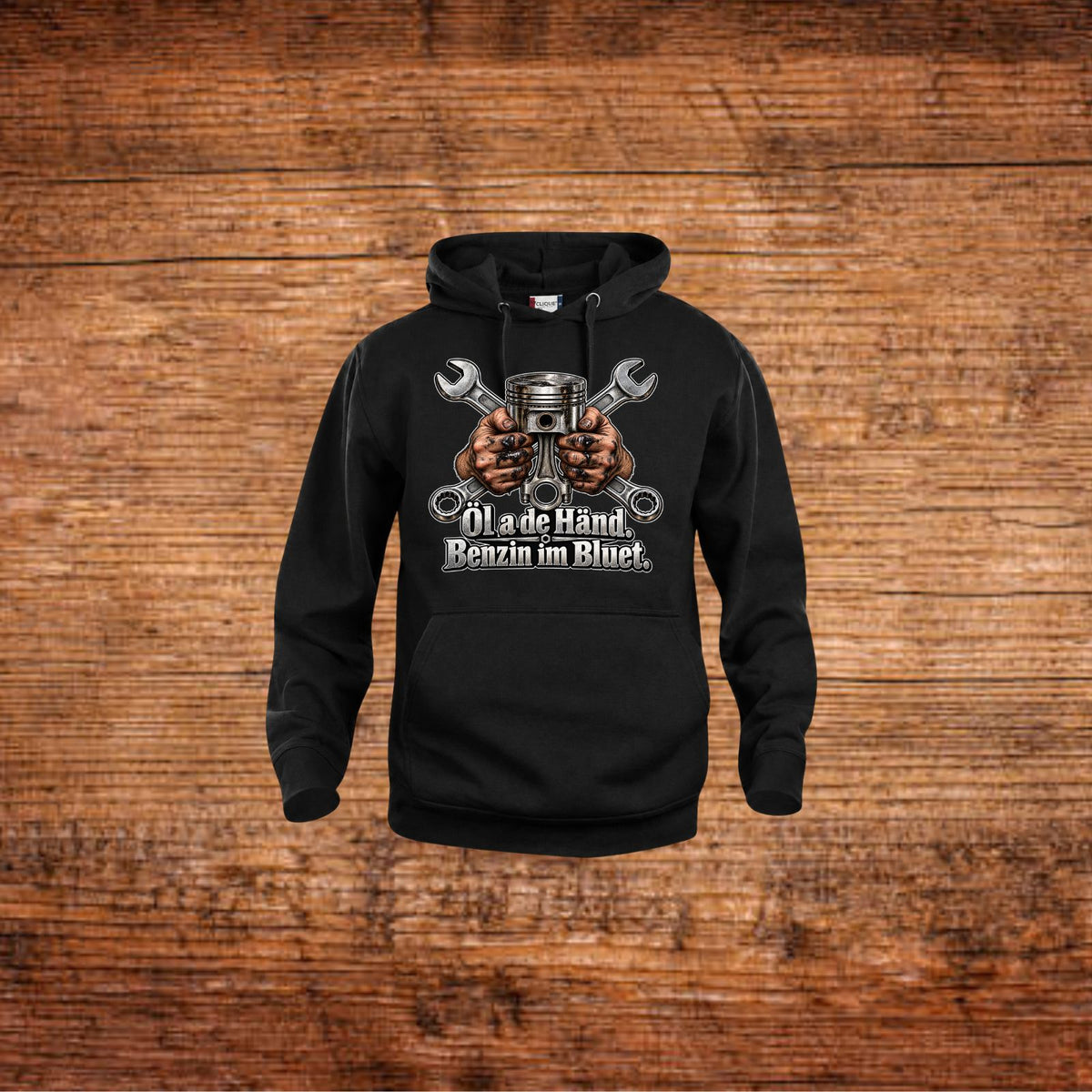 Schwarze Hoodie mit Kapuze und Schrauber-Print: Motor zwischen Händen, Text vorn